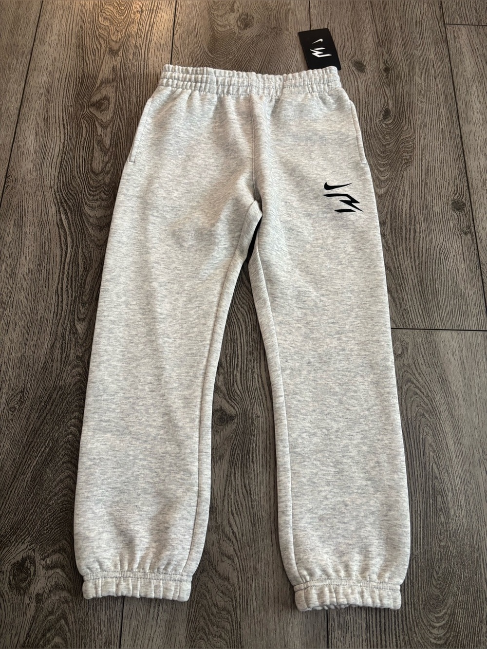 Nike Kids Light Gray Fleece Joggers with Black Logo